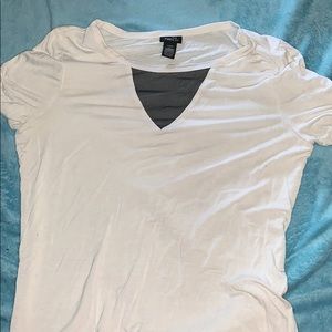 White shirt with black mesh design on top